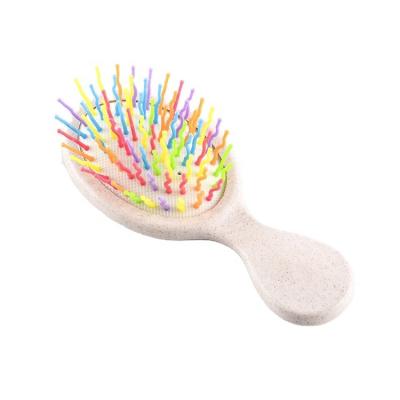 China Cushion kids cosmetics brush flexible detangle brush wheat single suction pla material small detangle brush hair for sale