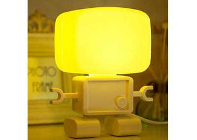 China Luces llevadas decorativas elegantes de la noche del dormitorio del bebé, lámpara de mesa linda del escritorio del sonido LED del robot en venta