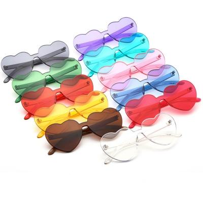 China Fashion Sunglasses Hot Sale Heart Rimless Sunglasses Patch Colored Sun Glasses for sale