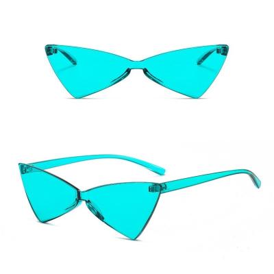 China Retro Fashion Sun Glasses Triangle Fashion Sunglasses For Women Colorful Rimless Sun Glasses for sale