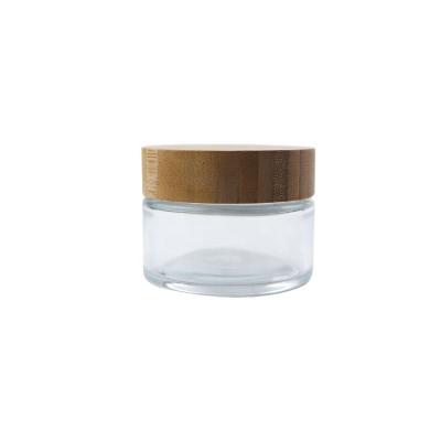 China Eco-Friendly Bamboo Cap With Gasket 100ml GM Large Moq Echo 100g Empty Glass Cosmetic Jars Friendly Body Cream Jars 100ml With Bamboo Lid Cap Lids for sale