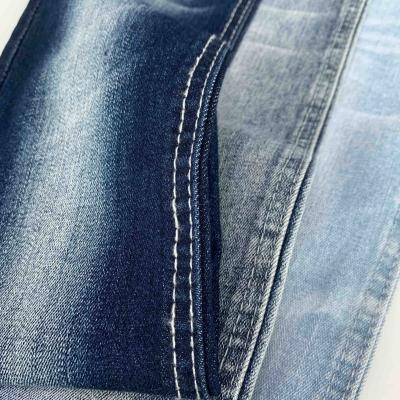 China Wrinkle Resistant 9.7oz Sirospun Sky Blue Stretch Woven Denim Fabric With Wick for sale