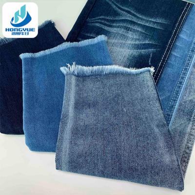 China Wrinkle Resistant Blue Lightweight Woven 7.7oz Denim Fabric Price For Jeans for sale