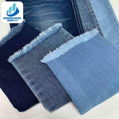 China Wrinkle Resistant Stretch Denim Fabric 9.7oz Soft Blue Denim Fabric Cut Dye Piece for sale