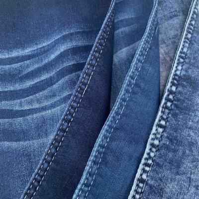 China Wrinkle Resistant Blue 9.3oz Cotton Polyester Spandex Super-stretch Satin Denim Fabric for sale