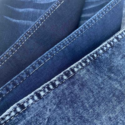 China Wrinkle Resistant Blue 8.8oz Cotton Polyester Spandex Super-stretch Satin Denim Fabric For Jeans for sale