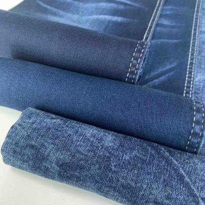 China Wrinkle Resistant Blue Denim Fabric Jeans 8.8oz Polyester Satin Material Denim Fabric for sale