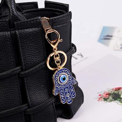 China 2021 Wholesale Classic PENDANT Car Metal BLUE EYE Fashion Metal Key Chains Key Chains for sale