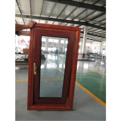 China Ventana de UPVC a prueba de viento, inclinación y giro, acabado de roble en venta