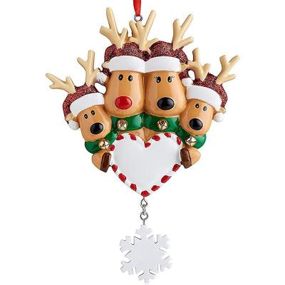 China New Design Polyresin Family Christmas Decorations Crafts Resin Reindeer Ornaments for sale