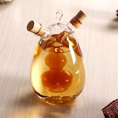 China Viable Hot Sale Olive Oil Bottles Hand Made Glass Bottle Dispenser for sale