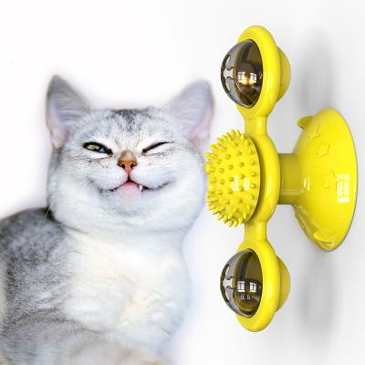 China Viable Grooming Pet Toy Windmill Touch Point Bell Rubber Molar Toy For Kitten for sale