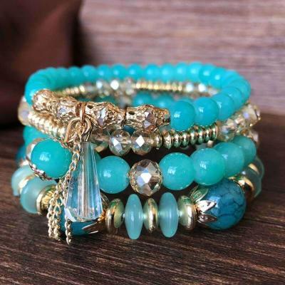 China Vintage 4PCS Women's Bohemian Hand Beaded Crystal Bracelet Set Multilayer Elastic for sale