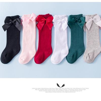 China Breathable Plain Spanish Color Mid Calf Length Sock Bow Style Soft Sock For Baby for sale