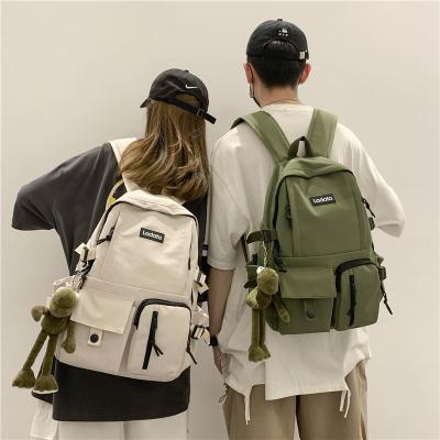 China Waterproof Spring 2021 New Harajuku Backpack Preppy Canvas Bag Junior Student Bag for sale