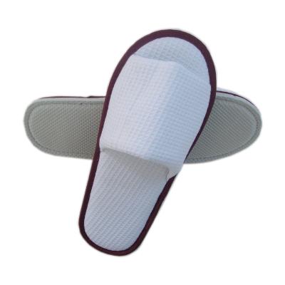 China F052 Logo Promotional Disposable Disposable Cheap Custom Made Waffle Hotel Slippers With EVA Insole for sale