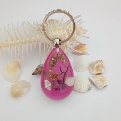 China Handmad Real Seahorse Teardrop Acrylic Keychain With Pink Background for sale