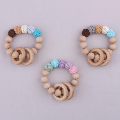 China Toy Handmade Nursing Wooden Soft Crochet Bead Teething Bead Knitted with Beach Wooden Beads for sale