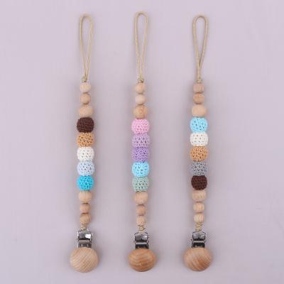 China BPA Free Feeding Colorful Wooden Beads Baby Pacifier Crochet Clips Wooden Baby Pacifier Chain for sale