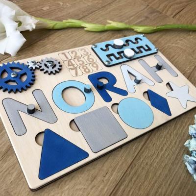 China Nursery Educational Busy Decor Board Puzzle Name Toy Custom Wooden Toy Blue Unique Gift with Pegs for Boy for sale