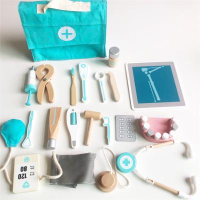 中国 Pretend Play Toy Set Children Medical Simulation Wooden Medicine Chest Set Pretend Doctor Educational Play Toys 販売のため