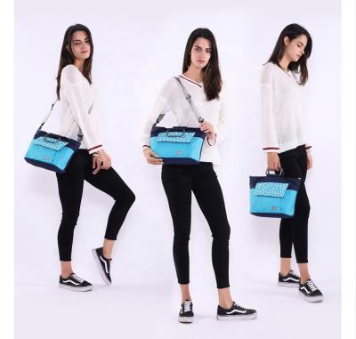 China Purpose VK New Fashion Office Lady Multifunctional Women's Multifunction Baby Stroller Nappy Diaper Message Shoulder Swap Nursery Tote Mummy Handbags for sale