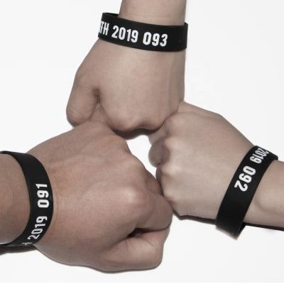 China With serial number factory supply sport team silicon wristband with customize numbering for sale