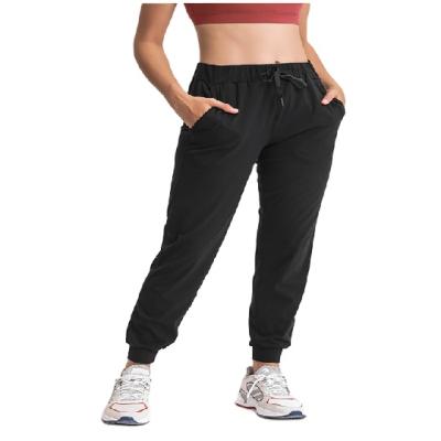 China Breathable Jogger Pants For Women Active Lounge Drawstring Waist Yoga Gaiters Sweatpants With Pockets for sale