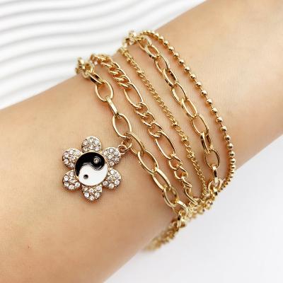 China Best Selling Wholesale Tai Chi Gossip Pendant High Quality Oil Drop Flower Charm Jewelry Bracelet Gold Plated Bracelet for sale