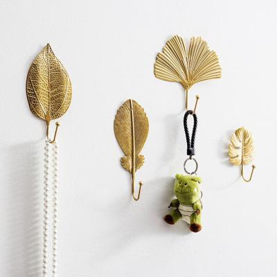 China Creative Gold Foil Wood Wall Hangings Coat Hangers Leaves Head Hook for sale