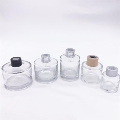 China Simple Design Recyclable 120ml Round Cylinder Diffuser Bottles Home Decorative Glass Bottle With Sticks for sale