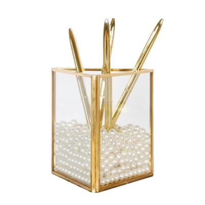 China Fashion Triangle Gold Metal Brush Holder and Storage Silicone Makeup Glass Cosmetic Organizer for sale