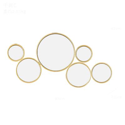 China Handcrafted Modern Home Luxurious Metal Frame Combination Round Decor Mirror Manufactures for sale