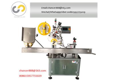 China Automatic round bottle horizontal labeling machine, small bottle sticker labeling machine for sale