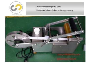 China Semi-automatic round bottle labeling machine, small bottle label pasting machine for sale