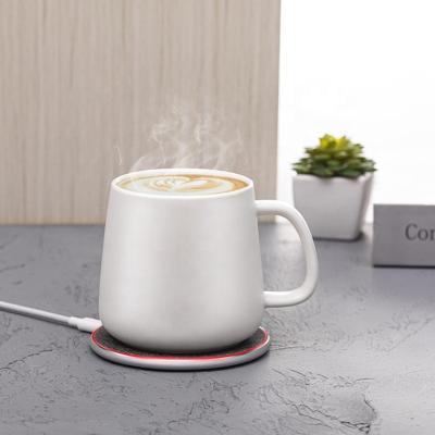 China Thermostat Heating Mug Smart Self Heating Mug with Wireless Phone Thermostat Coffee Cups Refill Warmer for Company Promotion Gift for sale