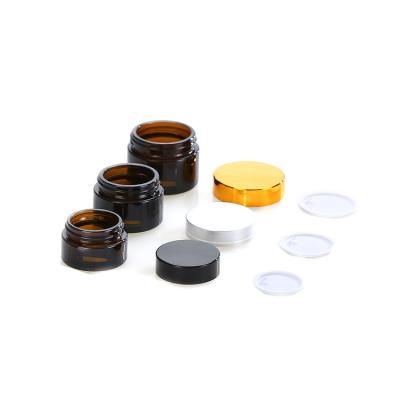 China Free Sample Eco-friendly Low Price Cosmetic Jar 3ml 5ml 7ml 10ml 15ml 20ml 30ml 50ml 100ml Concentrate Amber Clear Glass Jar With Black Lid for sale