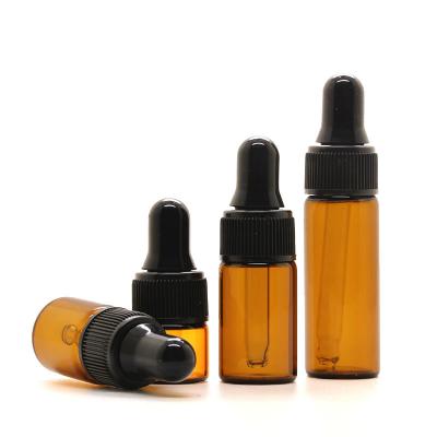 China Easy-taking mini tubular cosmetic package wholesale clear blue amber1ml 2ml 3ml 4ml 5ml essential oil dropper glass bottle with dropper cap for sale