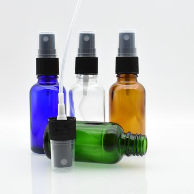 China Cosmetic Cheap Clear Amber Essential Oil Spray Green Blue Glass Bottles 5ml 10ml 15ml 20ml 30ml 50ml 100ml for sale