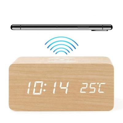 China Hot sale voice control temperature radio mode led alarm clock mobile phone wireless charger for sale