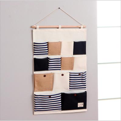 China Korean Simple Cool Sustainable Door Household Canvas Storage Bag Wall Mounted Closet Bag for sale