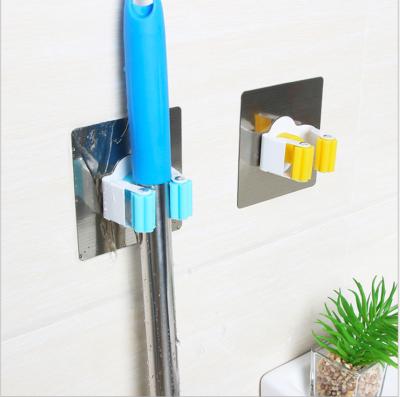 China Durable Flexible Adhesive Wall Mount StorageSelf Garden Tool Organizer Broom Mop Holder Broom Cleaning Clip for sale