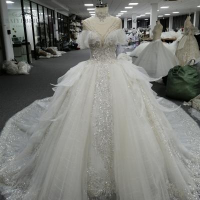 China Anti-Static Shiny Fashionable Trend Handmade Bride Wedding Dresses With Big Bow On The Back for sale