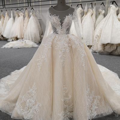 China Turkey Wholesale Anti-Static Bride Running Dress Beautiful Crystal Beaded Pearls Champagne Full Sleeve Wedding Dress D18145 for sale