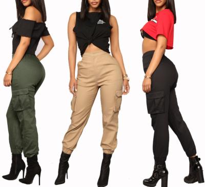 China Anti-wrinkle fashion women trendy cargo pants solid color pants for ladies harem pencil pants with pockets for sale