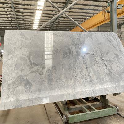 China Brazilian super white quartzite slabs natural texture top quality best price for kitchen countertops for sale