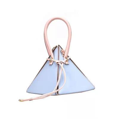 China 2021 Normcore Fashion Style Korean Personality Triangle Lady Bag Creative Stripes Portable Shoulder Lantern Handbag for sale