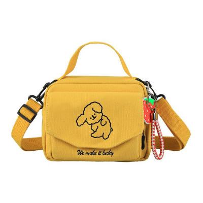 China Cute Style Preppy Girls Canvas Bag Cartoon Printing Luxury Messenger Bag Ladies Shoulder Tote Bag Handbags for sale