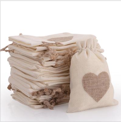 China Recyclable White Heart Linen Gift Bags 8x10cm 9x12cm Vintage Burlap Sack Can Custom Logo Pouches Makeup Jewelry Linen Packaging for sale