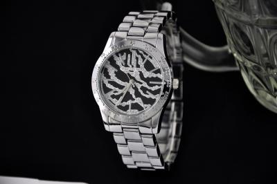 China Silver Mens Metal Wrist Watch With Diamond Zebra Strip Dial And Simple Chic Design for sale